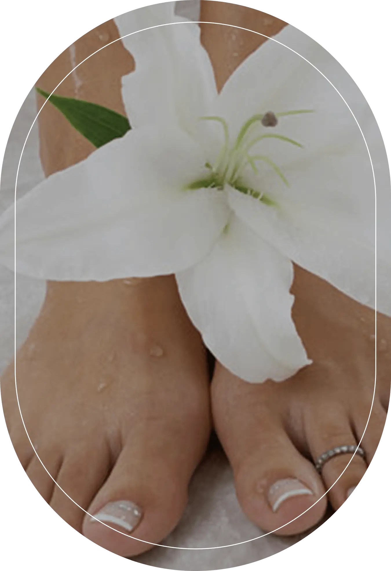 Feet with white lily flower